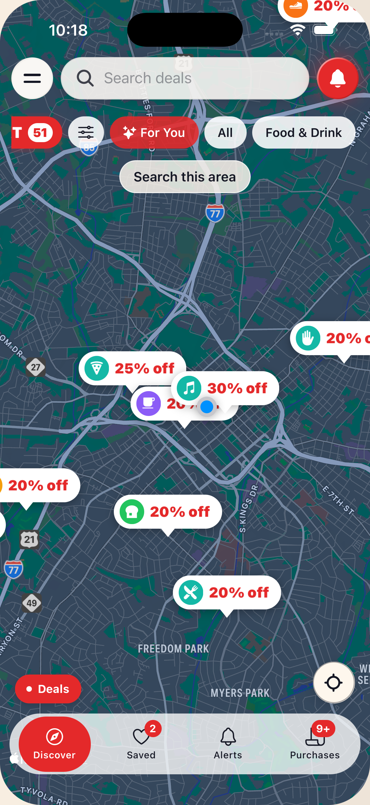 The shopper map covered in deal pins, each showing its discount
